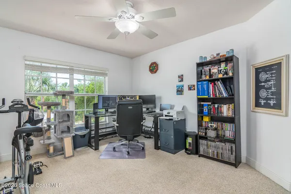 a view of livingroom with furniture and floor to ceiling window