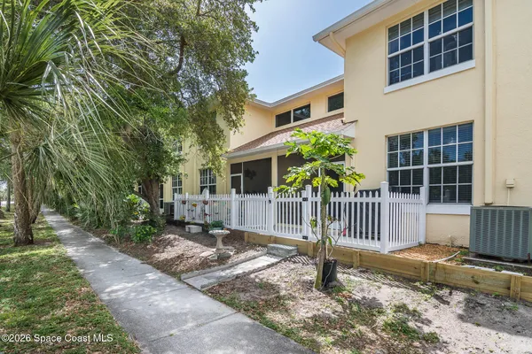 a view of swimming pool with chairs