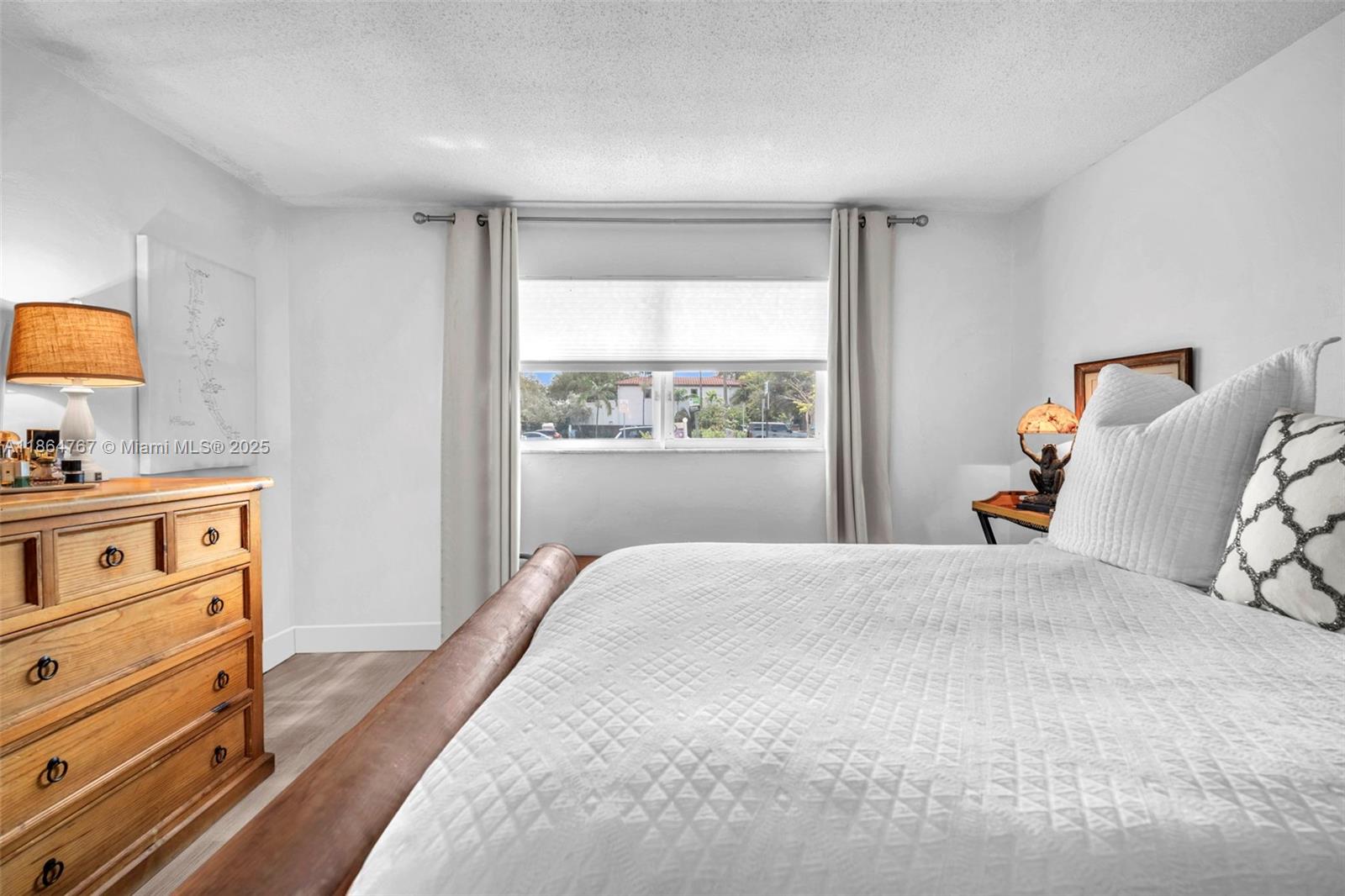 1280 Southeast 2nd Court, Unit 1 Fort Lauderdale, FL 33301 - Photo 13 of 34 a bedroom with a bed and a window