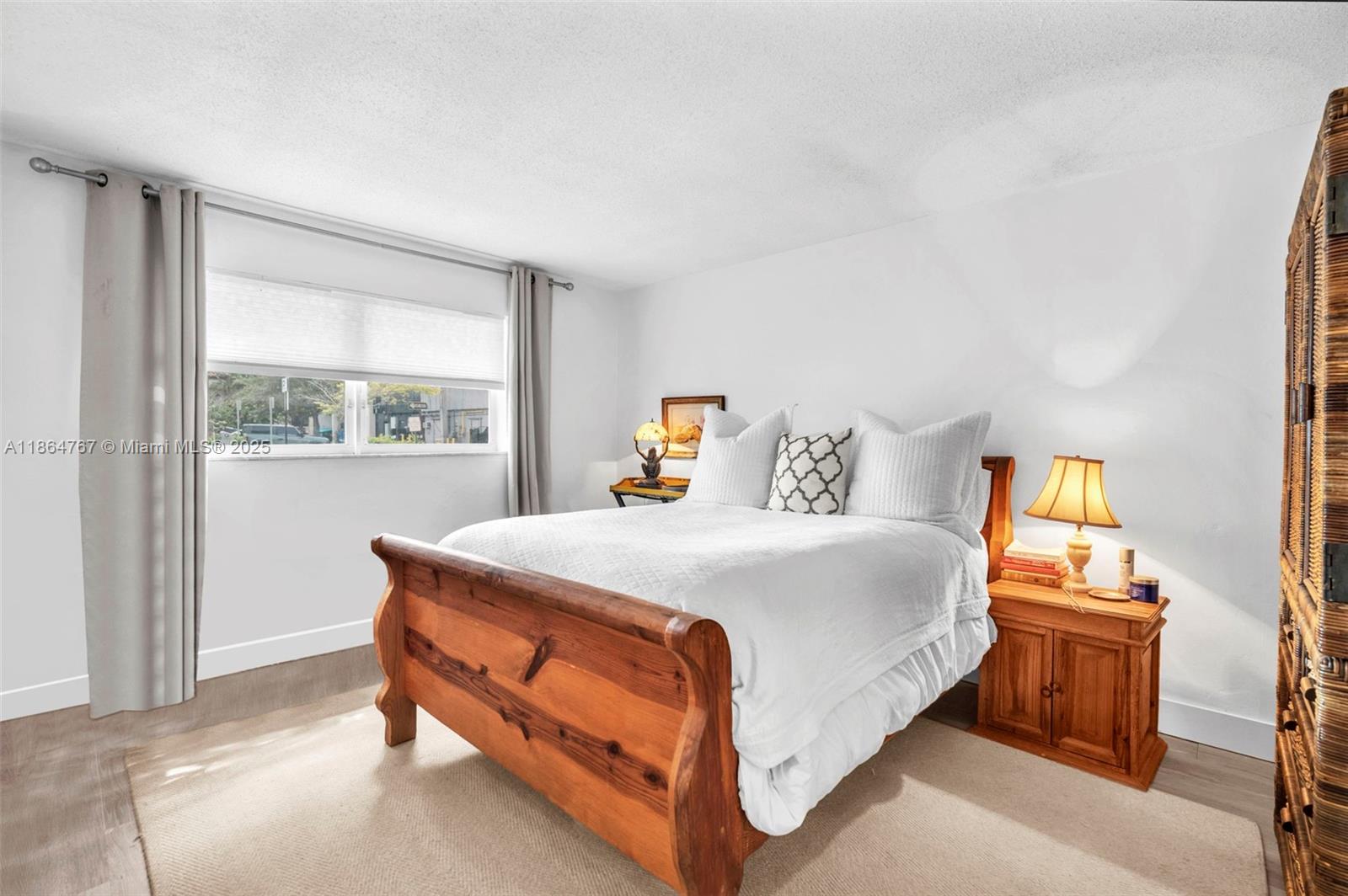 1280 Southeast 2nd Court, Unit 1 Fort Lauderdale, FL 33301 - Photo 14 of 34 a bedroom with a bed and window