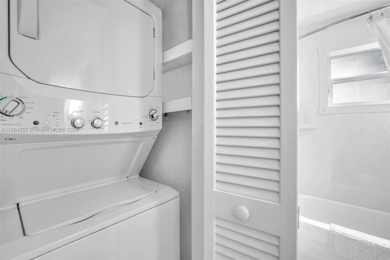 1280 Southeast 2nd Court, Unit 1 Fort Lauderdale, FL 33301 - Photo 18 of 34 a utility room with dryer and washer