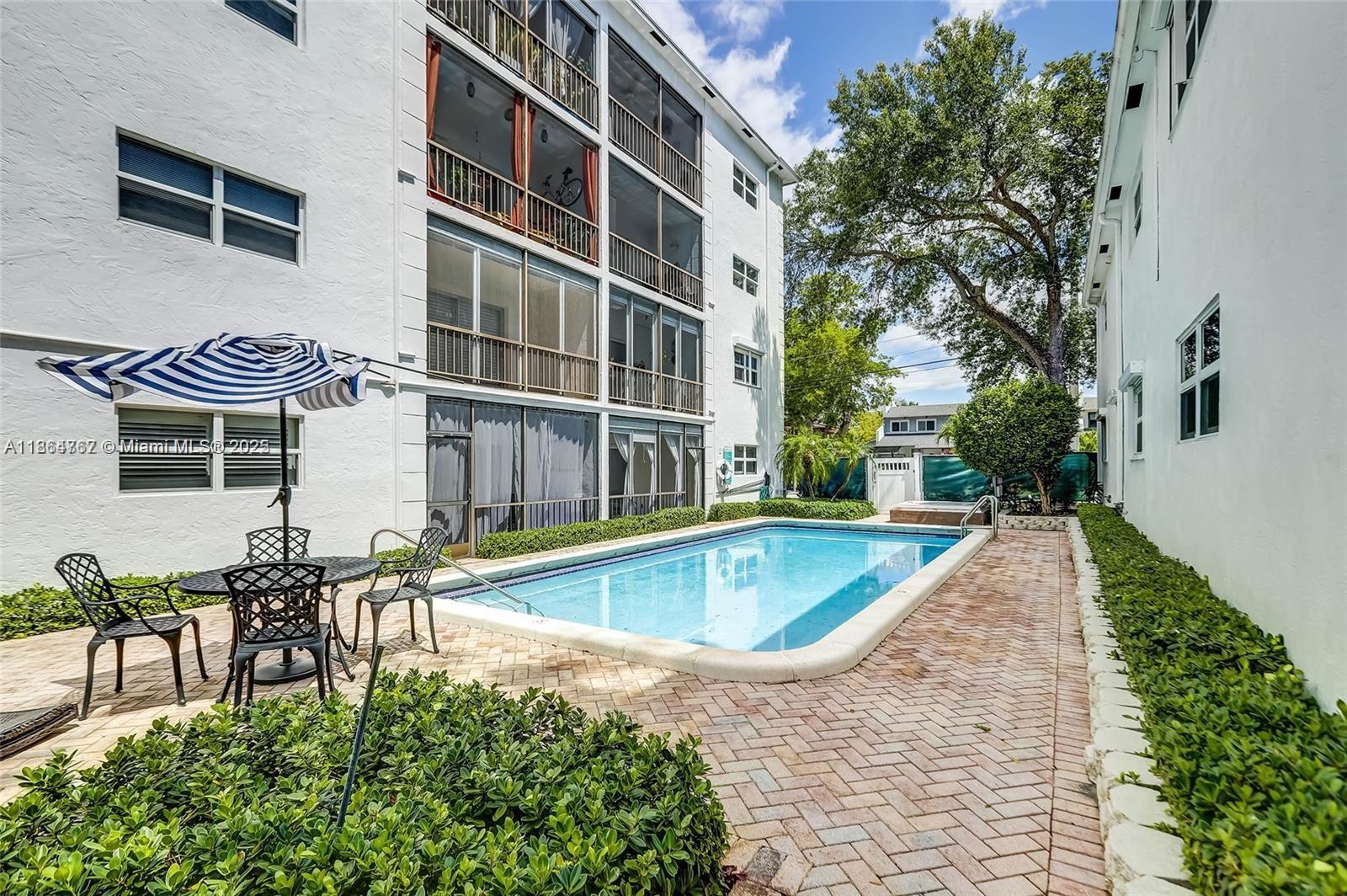 1280 Southeast 2nd Court, Unit 1 Fort Lauderdale, FL 33301 - Photo 19 of 34 swimming pool with outdoor seating and yard