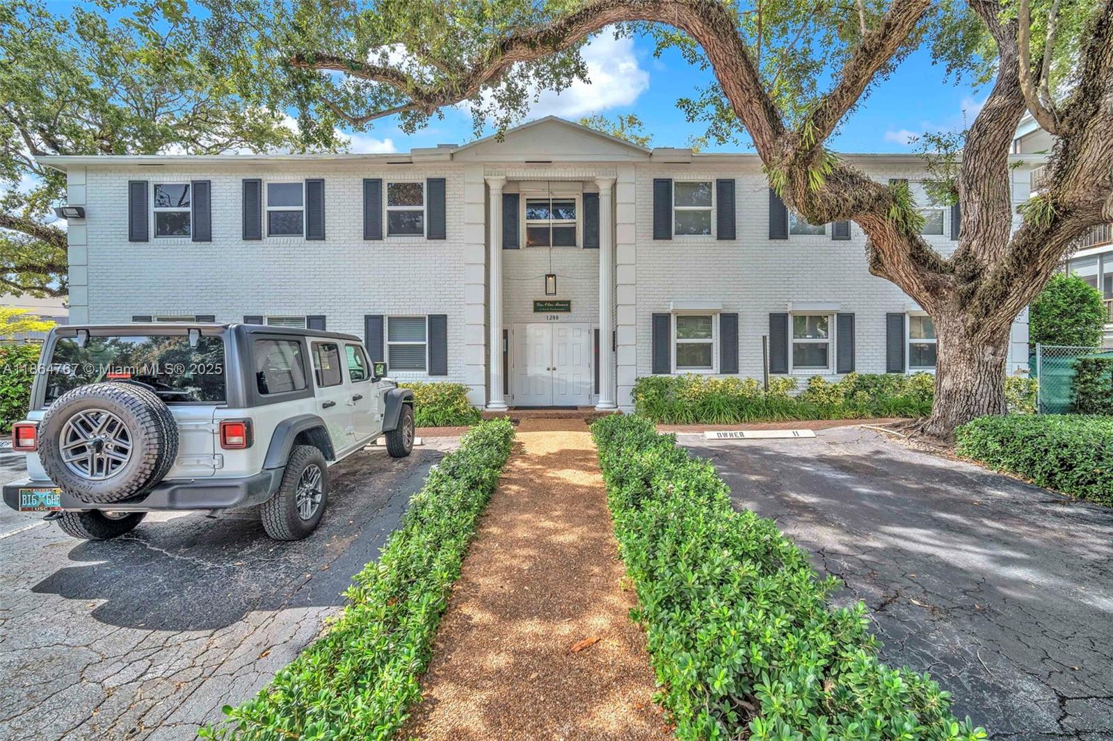 1280 Southeast 2nd Court, Unit 1 Fort Lauderdale, FL 33301 - Photo 2 of 34 a front view of a house with garden