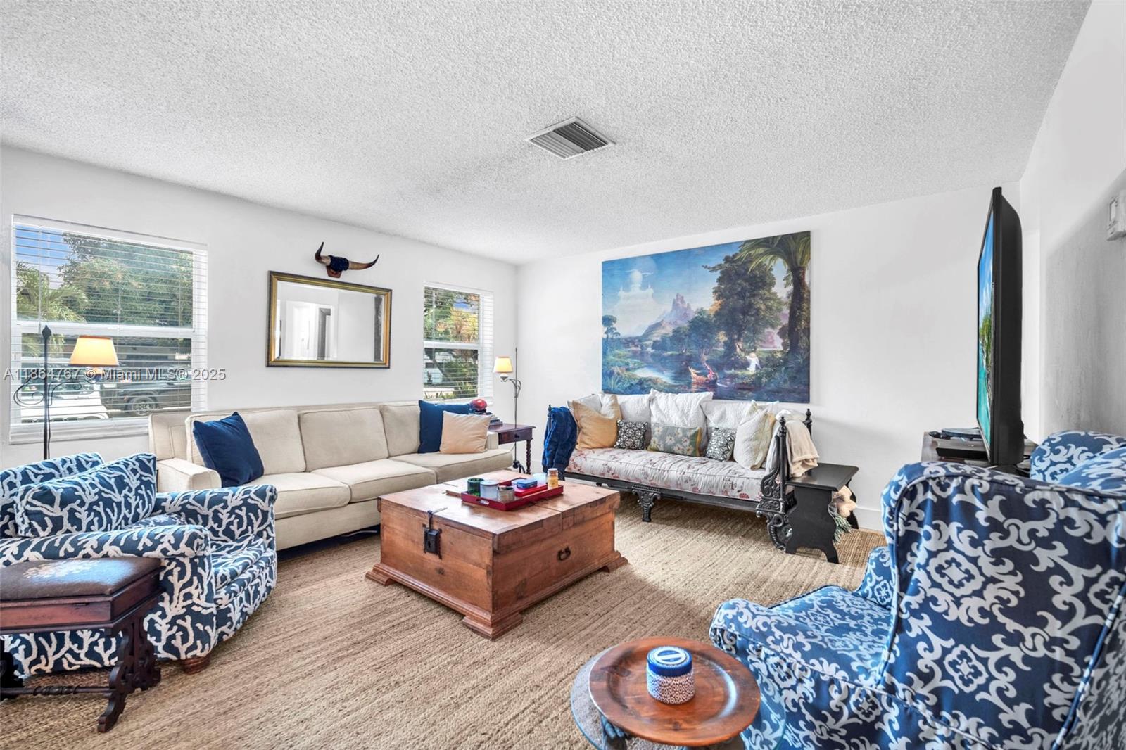 1280 Southeast 2nd Court, Unit 1 Fort Lauderdale, FL 33301 - Photo 7 of 34 a living room with furniture wooden floor and a large window