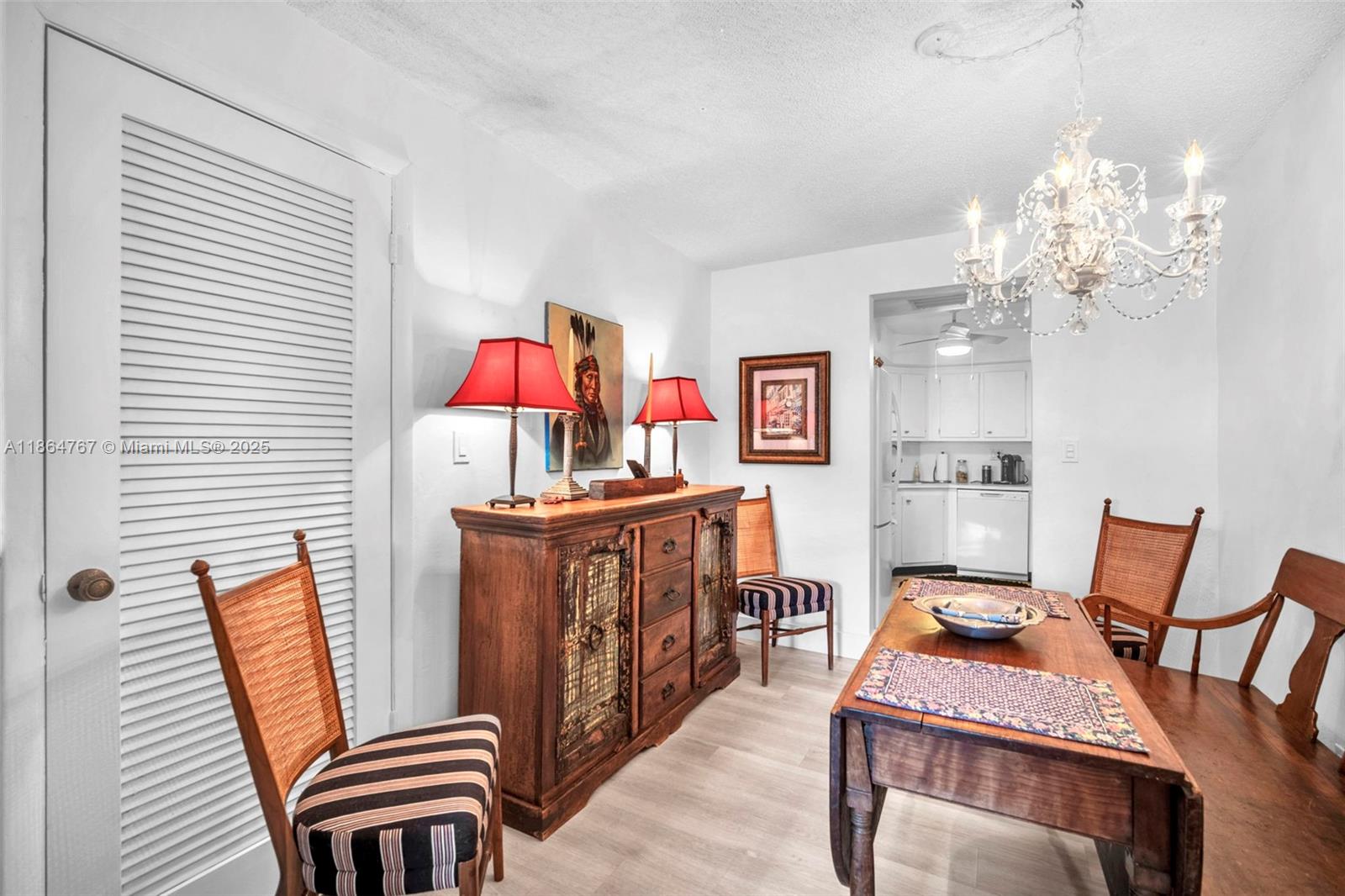 1280 Southeast 2nd Court, Unit 1 Fort Lauderdale, FL 33301 - Photo 9 of 34 a reading room with furniture and a chandelier
