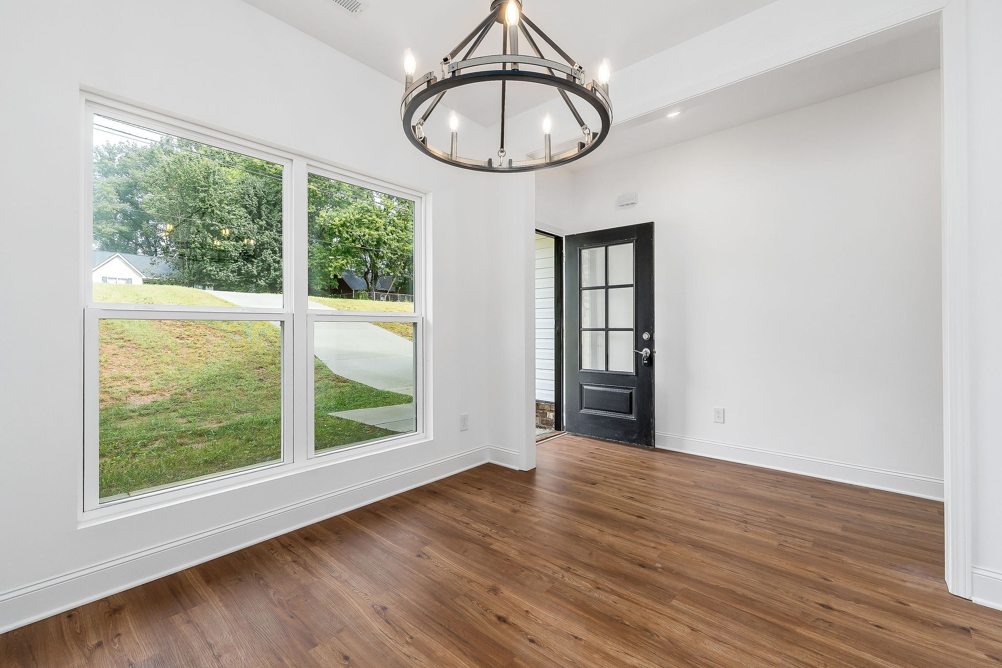 431 Old Morrison Road McMinnville, TN 37110 - Photo 15 of 45 a view of a room with wooden floor a chandelier