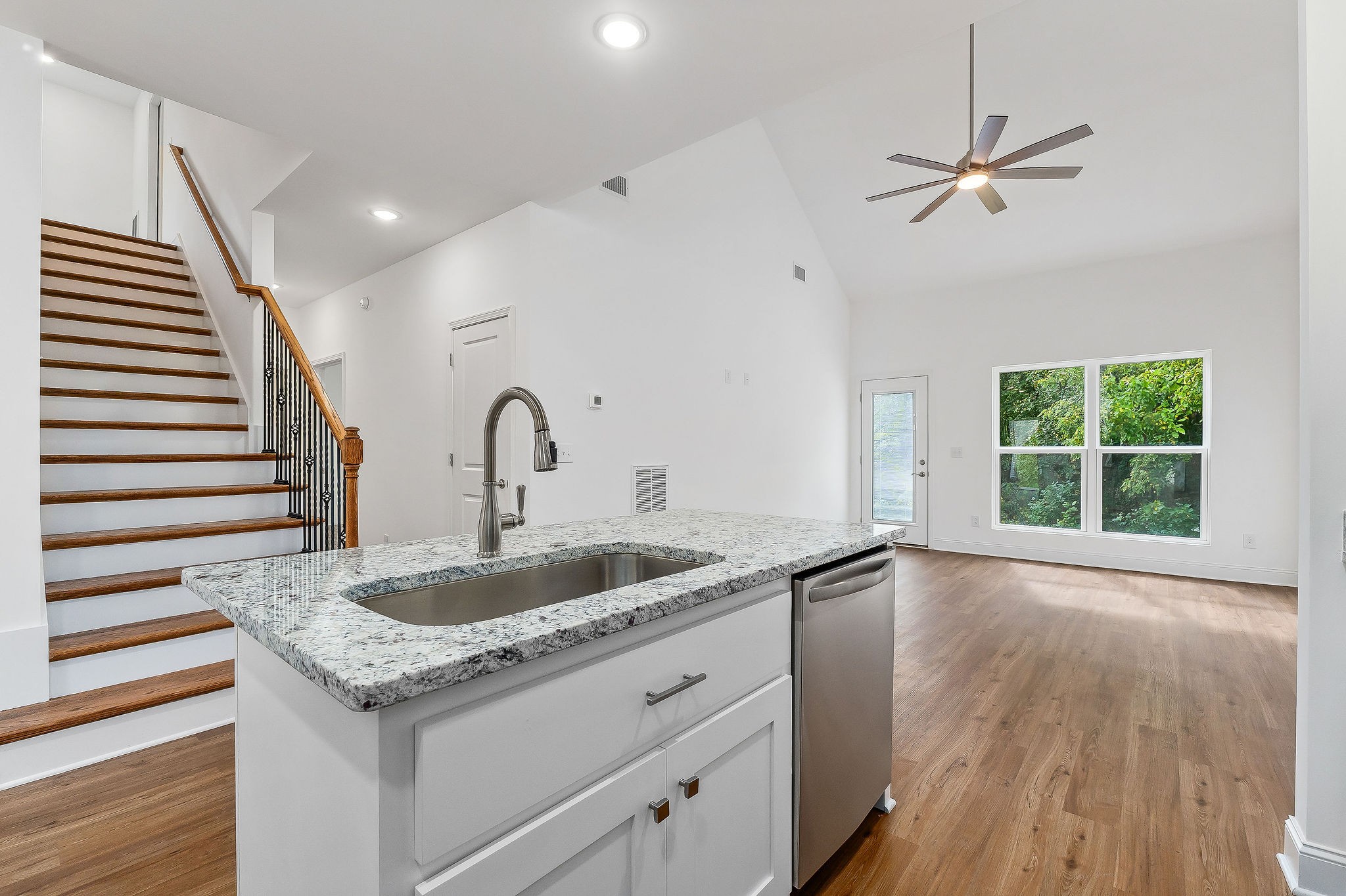 431 Old Morrison Road McMinnville, TN 37110 - Photo 16 of 45 a kitchen with granite countertop a sink and a window