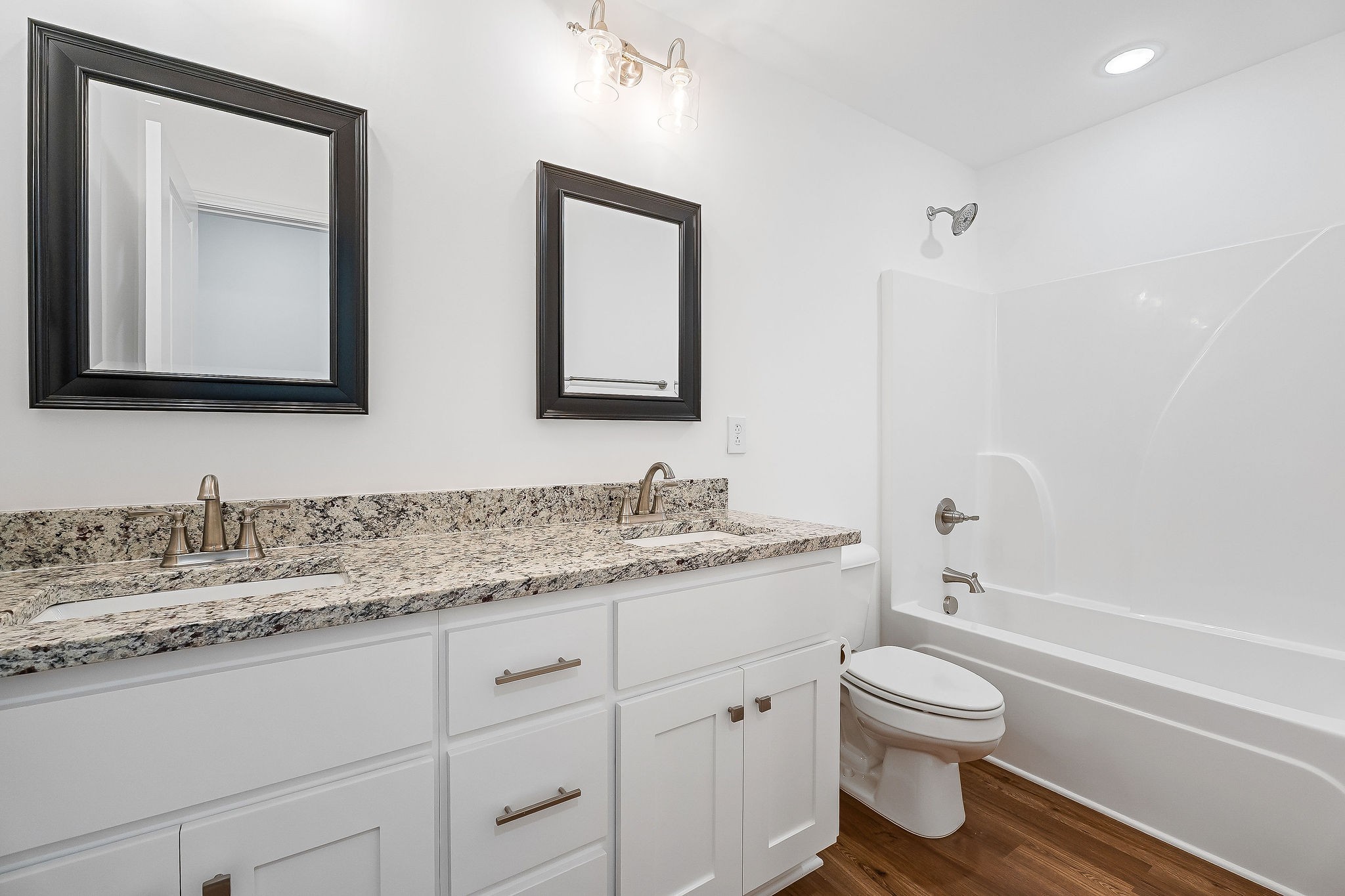 431 Old Morrison Road McMinnville, TN 37110 - Photo 33 of 45 a bathroom with a granite countertop toilet sink and mirror