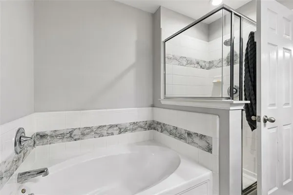 a close view of a bathtub in bathroom