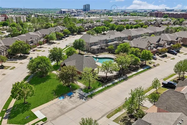 an aerial view of a city with lots of residential buildings