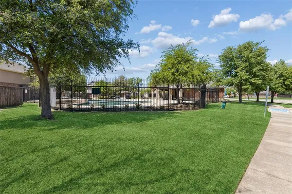 a view of a house with a big yard