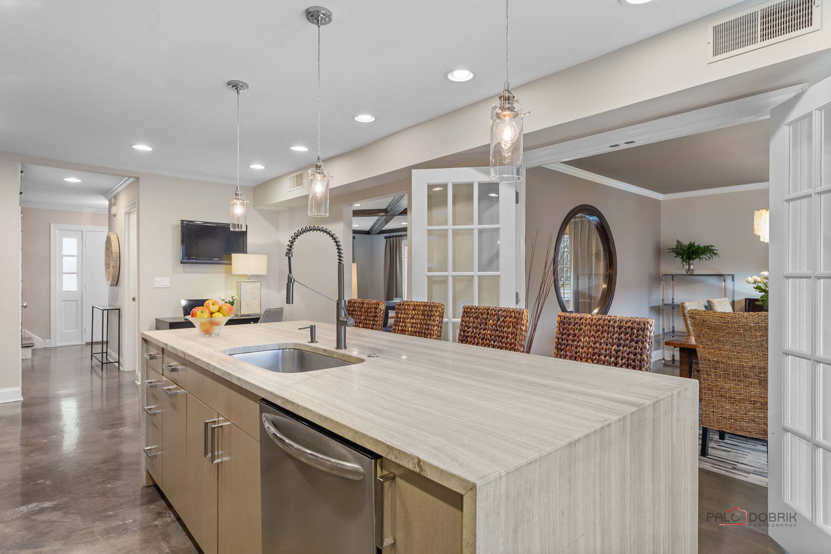 2 North Tower Road Oak Brook, IL 60523 - Photo 11 of 40 a large kitchen with stainless steel appliances granite countertop a large island in the center