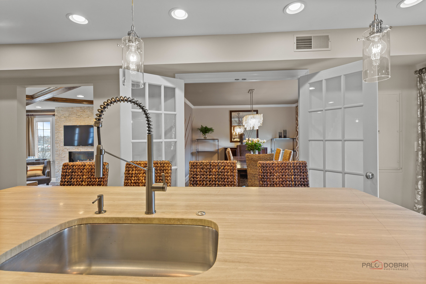 2 North Tower Road Oak Brook, IL 60523 - Photo 12 of 40 a kitchen with stainless steel appliances kitchen island granite countertop a sink and cabinets