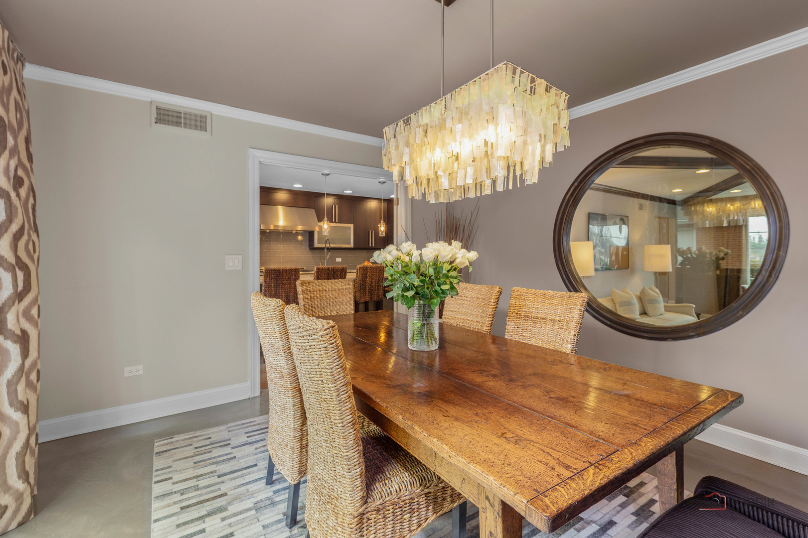 2 North Tower Road Oak Brook, IL 60523 - Photo 14 of 40 a view of a dining room with furniture and chandelier