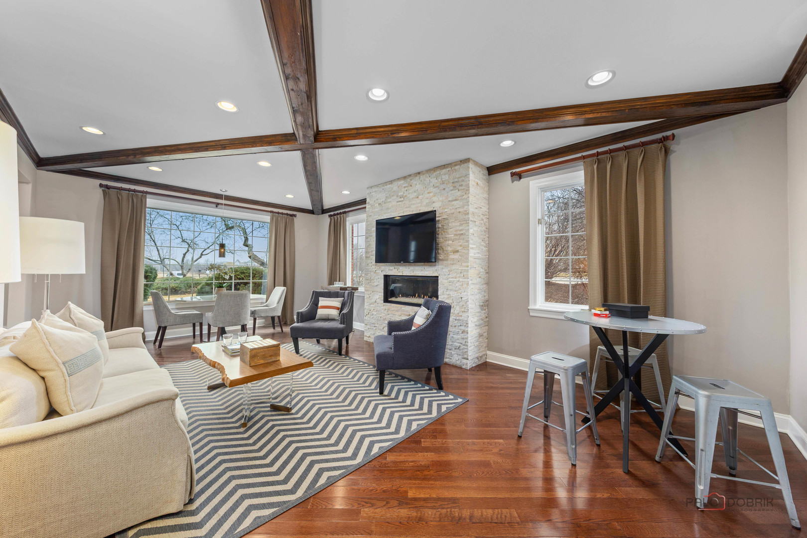 2 North Tower Road Oak Brook, IL 60523 - Photo 18 of 40 a living room with furniture or outdoor view and a large window