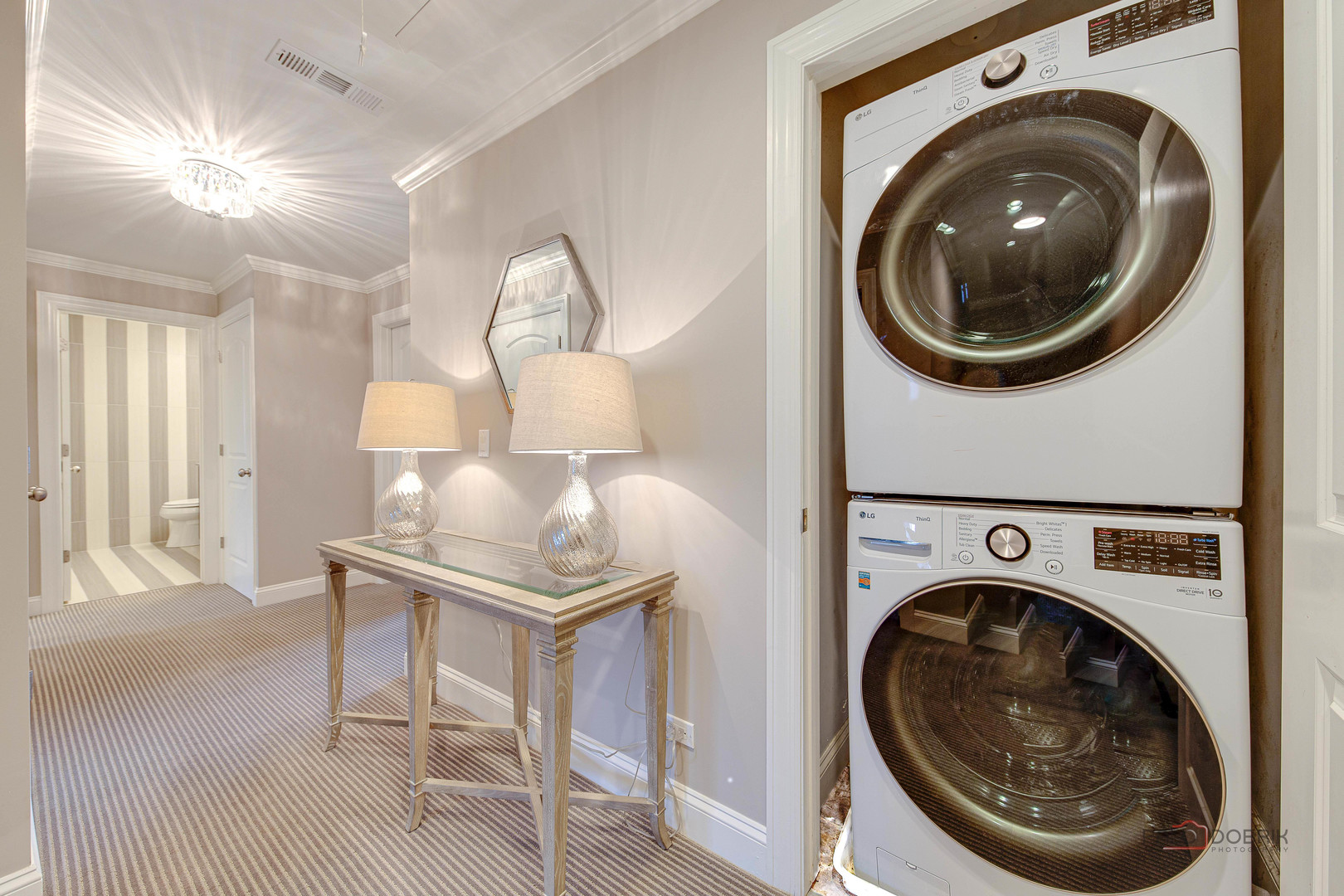 2 North Tower Road Oak Brook, IL 60523 - Photo 21 of 40 a view of washer and dryer in a utility room