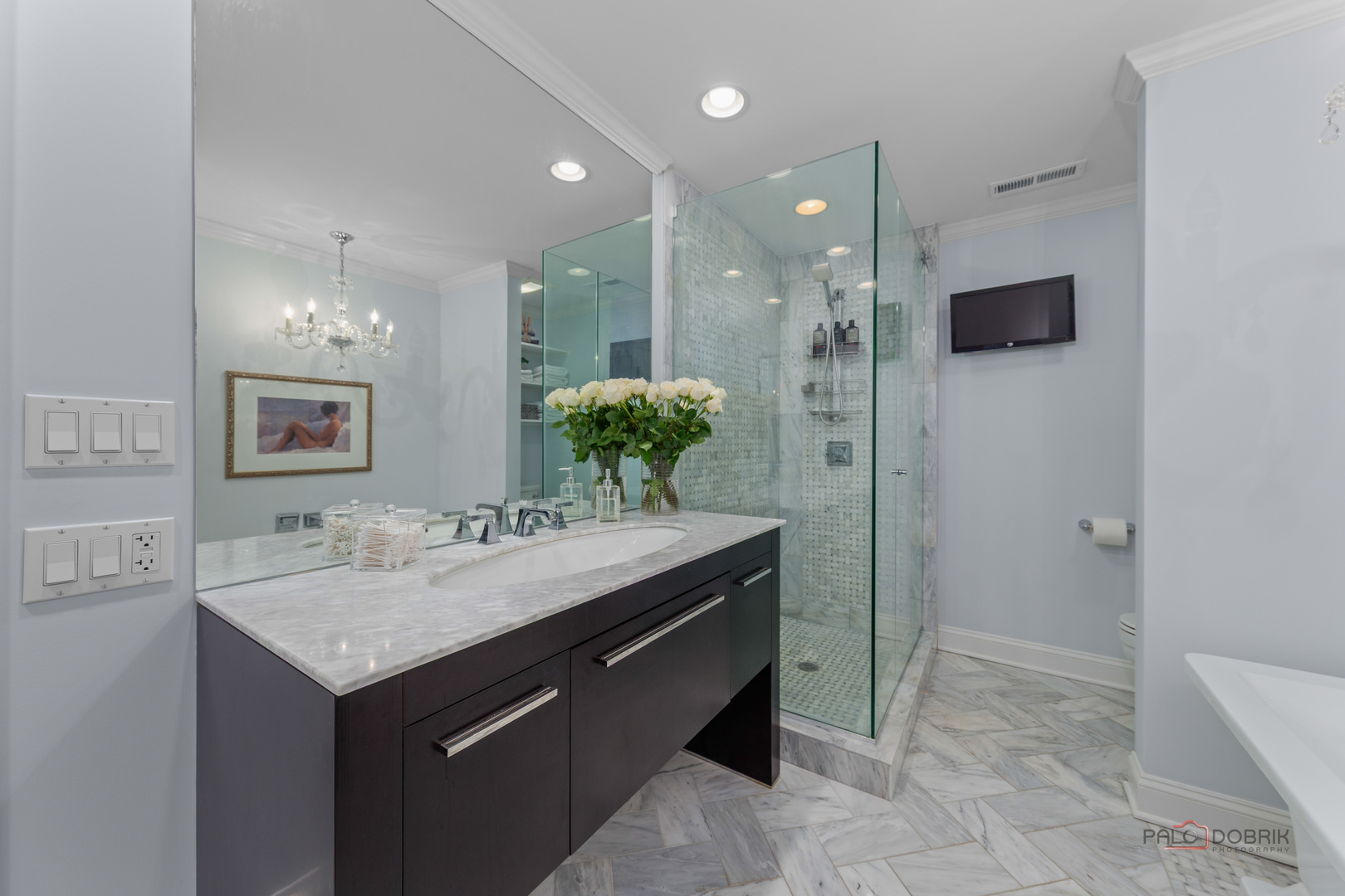2 North Tower Road Oak Brook, IL 60523 - Photo 29 of 40 a bathroom with a sink and a mirror