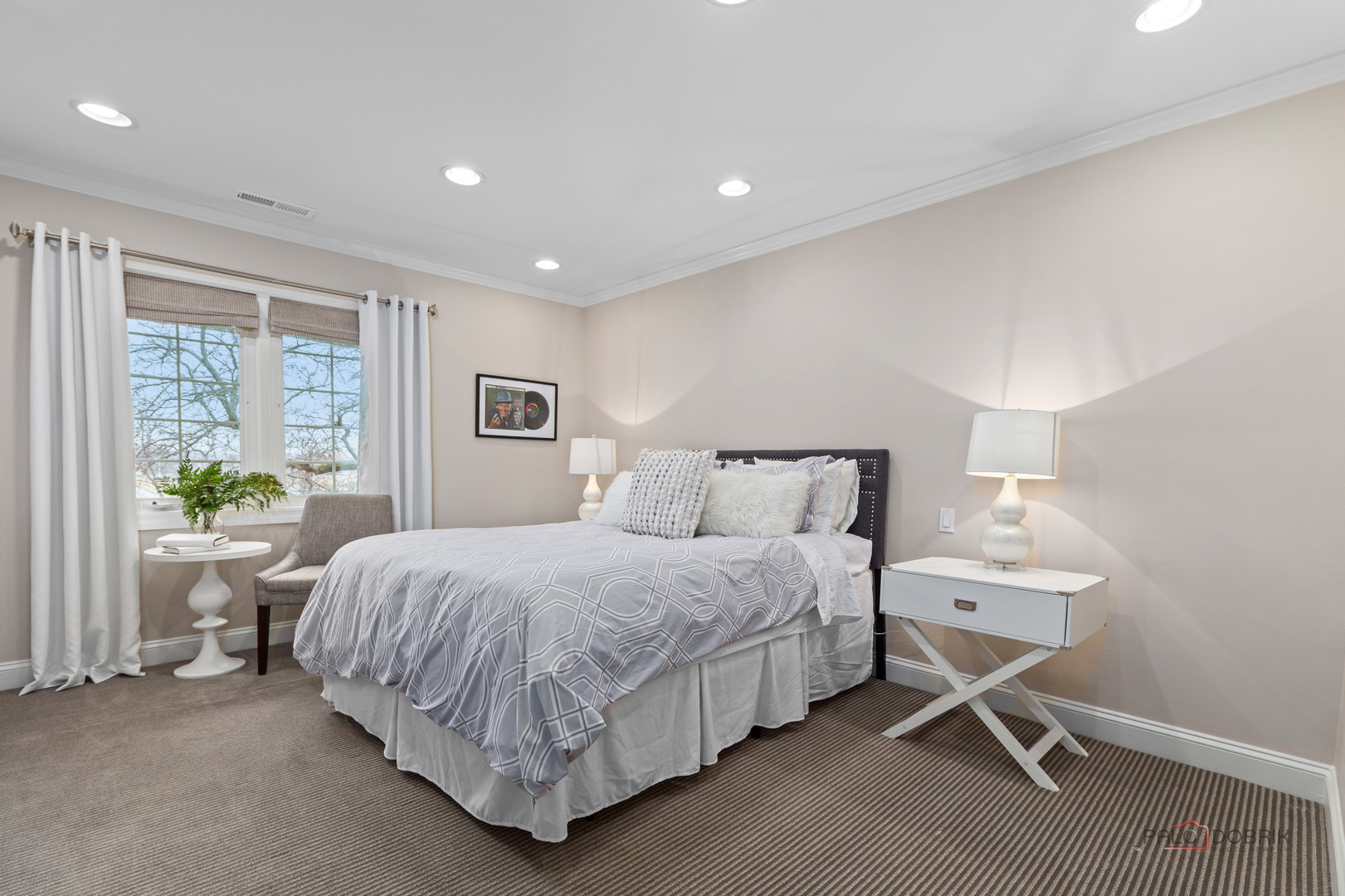 2 North Tower Road Oak Brook, IL 60523 - Photo 30 of 40 a bedroom with a bed and a window