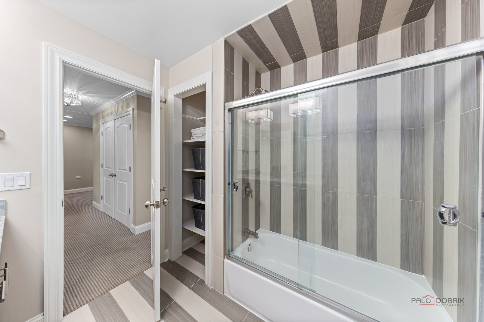 2 North Tower Road Oak Brook, IL 60523 - Photo 33 of 40 a bathroom with a bathtub and a shower