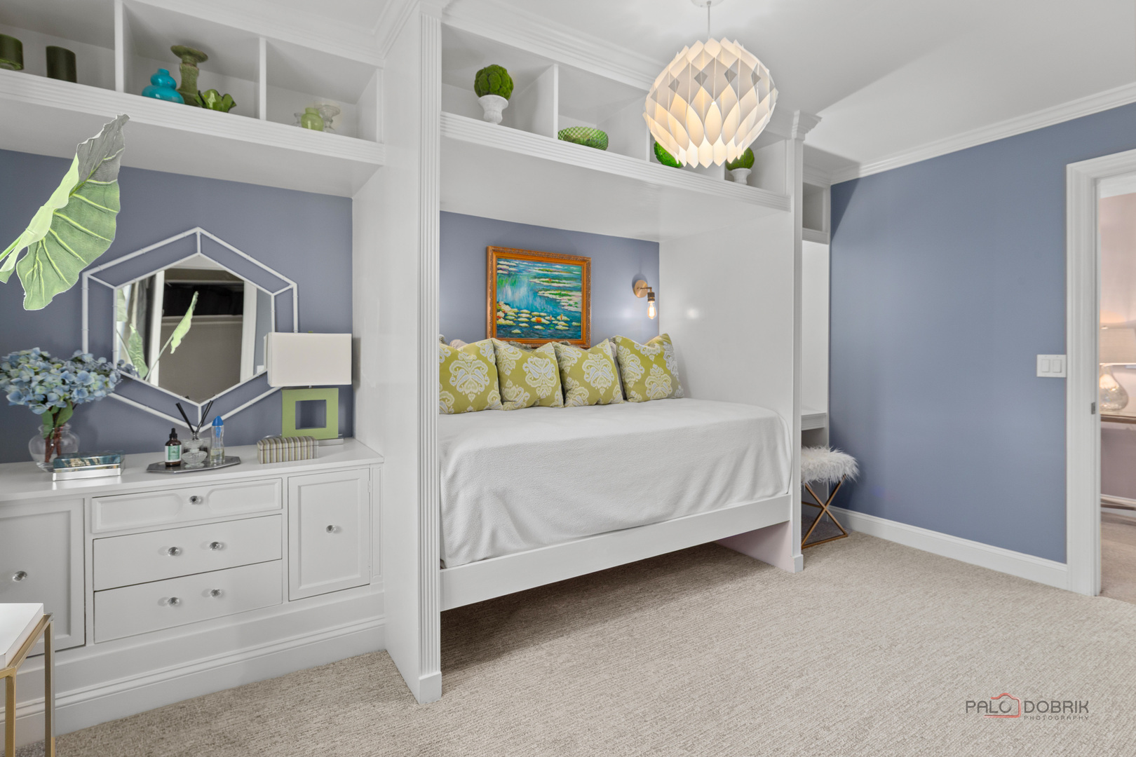 2 North Tower Road Oak Brook, IL 60523 - Photo 34 of 40 a bedroom with a bed and a dresser in it