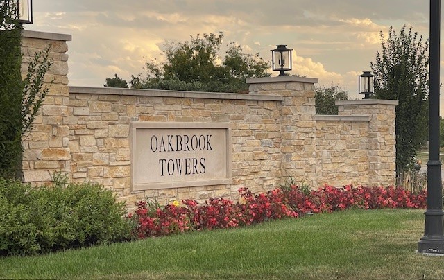 2 North Tower Road Oak Brook, IL 60523 - Photo 35 of 40 a sign on the side of building