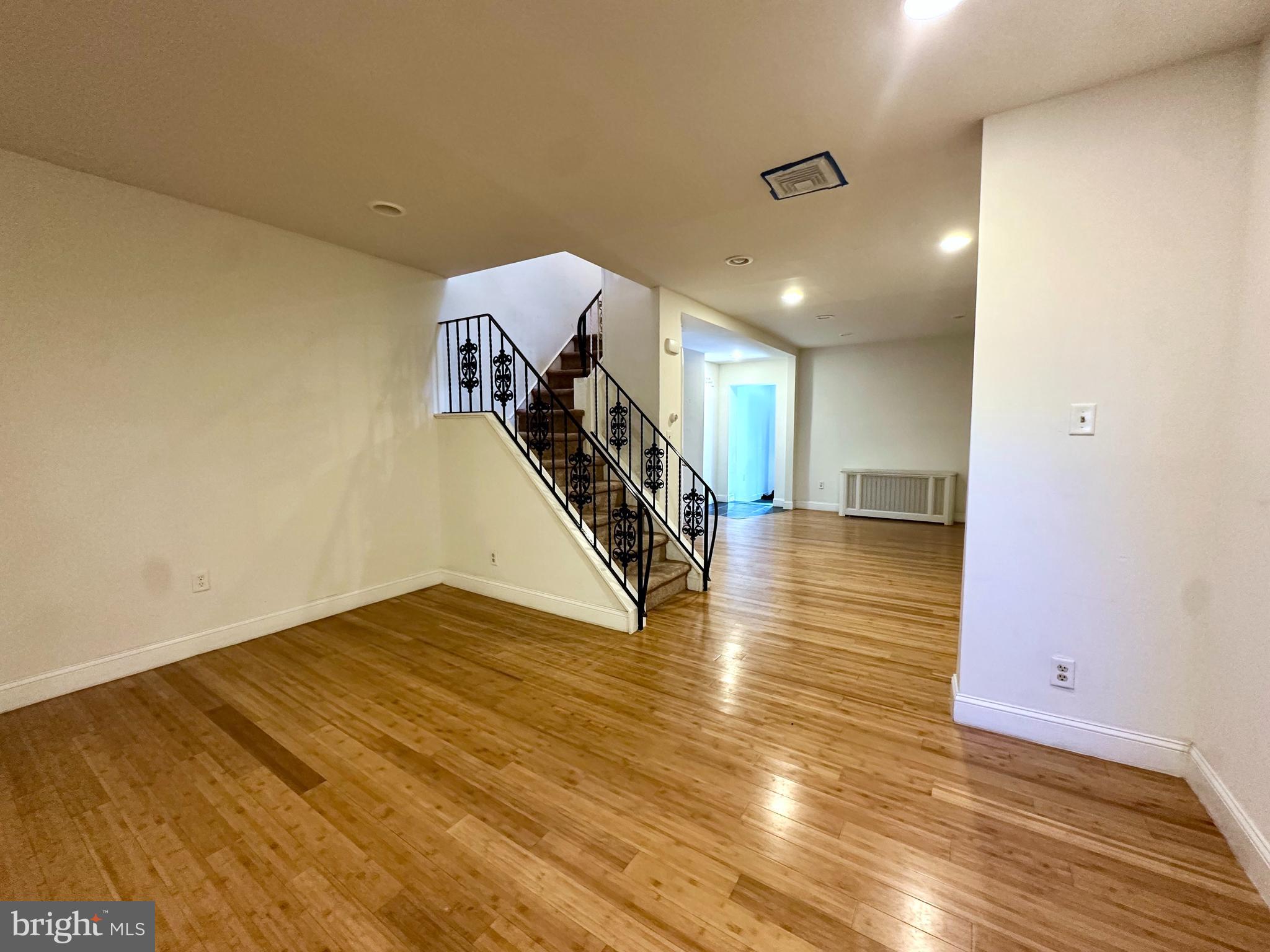 6209 Walnut Street Philadelphia, PA 19139 - Photo 4 of 13 a view of a livingroom with wooden floor