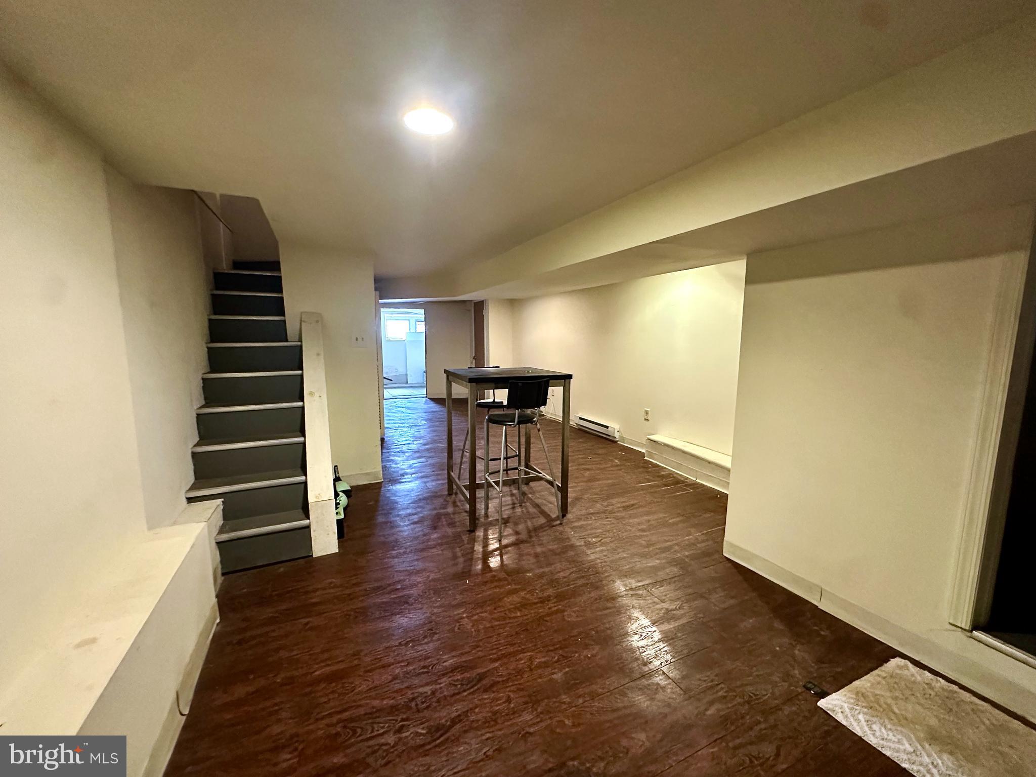 6209 Walnut Street Philadelphia, PA 19139 - Photo 6 of 13 a view of a living room with wooden floor