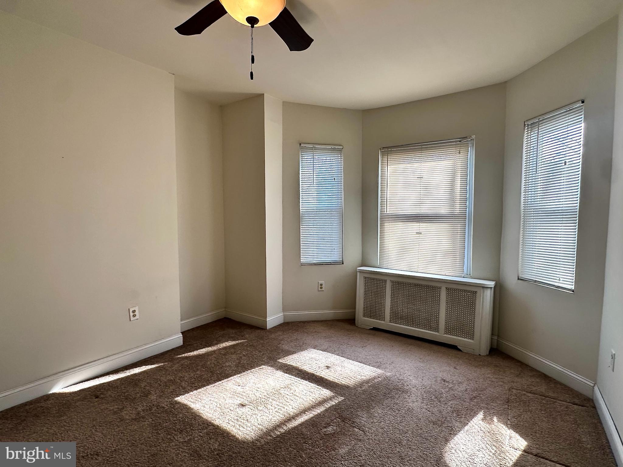 6209 Walnut Street Philadelphia, PA 19139 - Photo 9 of 13 a view of an empty room with a window