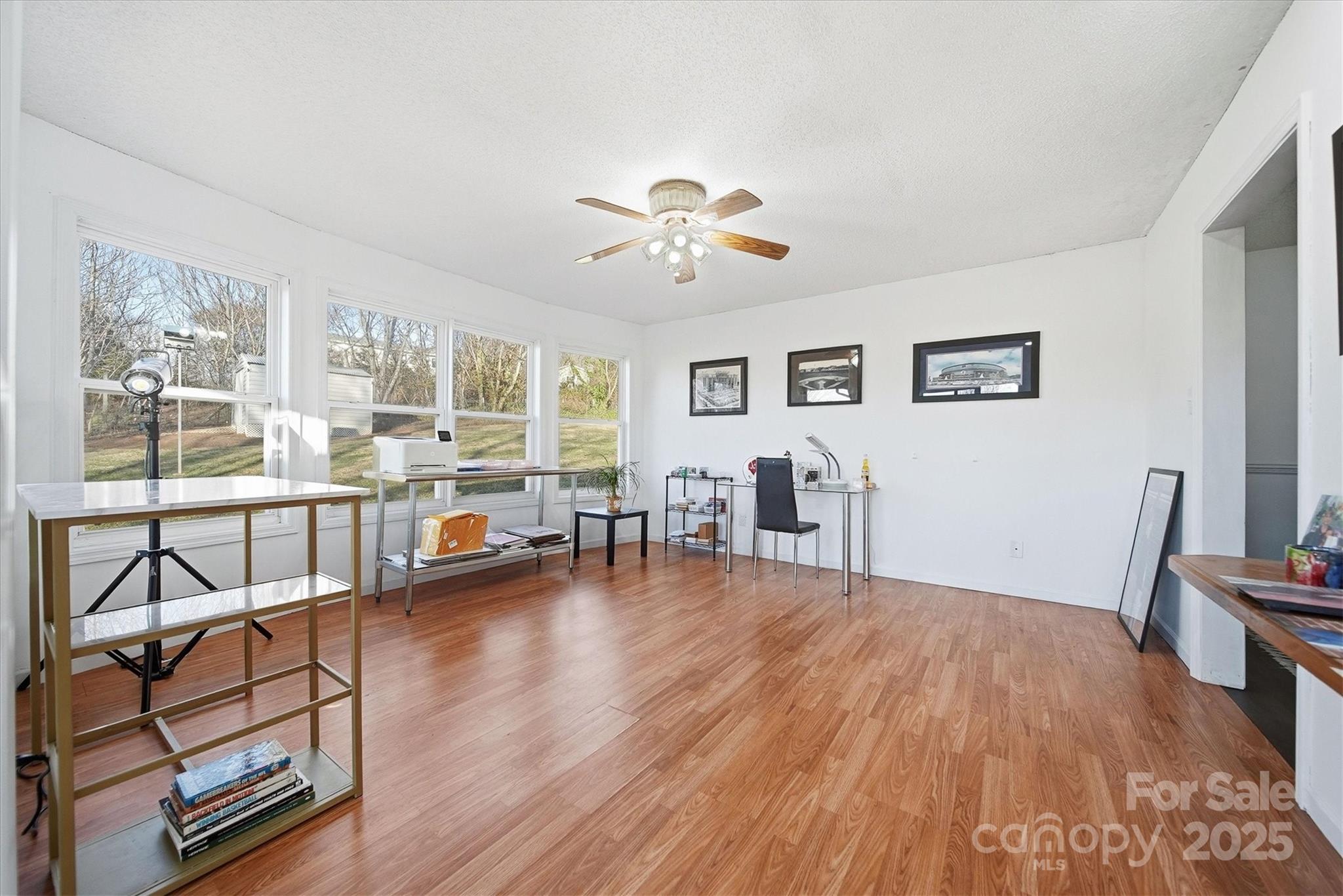 1007 Millbrook Place Southeast Lenoir, NC 28645 - Photo 20 of 46 a living room with furniture and a wooden floor