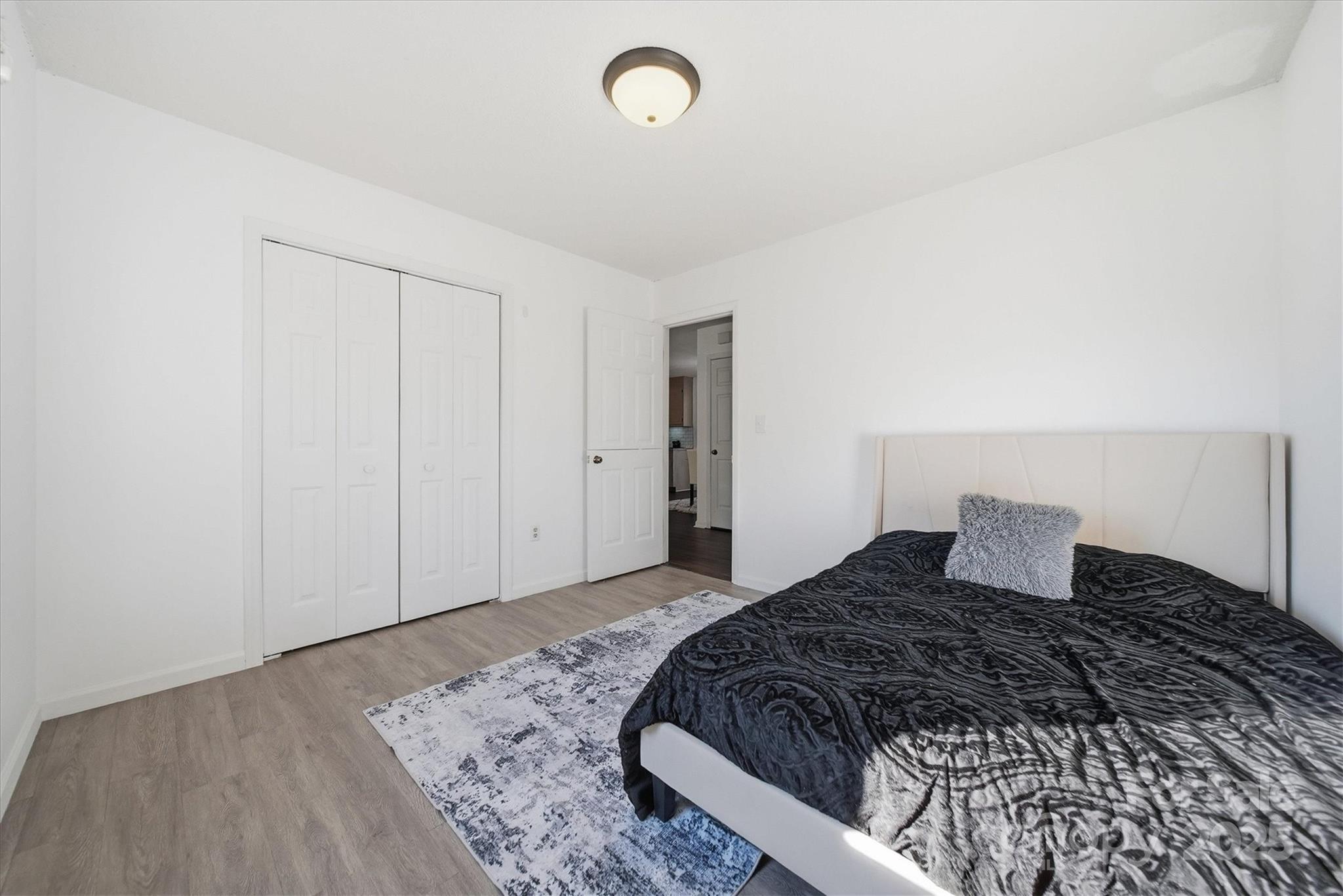 1007 Millbrook Place Southeast Lenoir, NC 28645 - Photo 29 of 46 a bedroom with a bed and a dresser