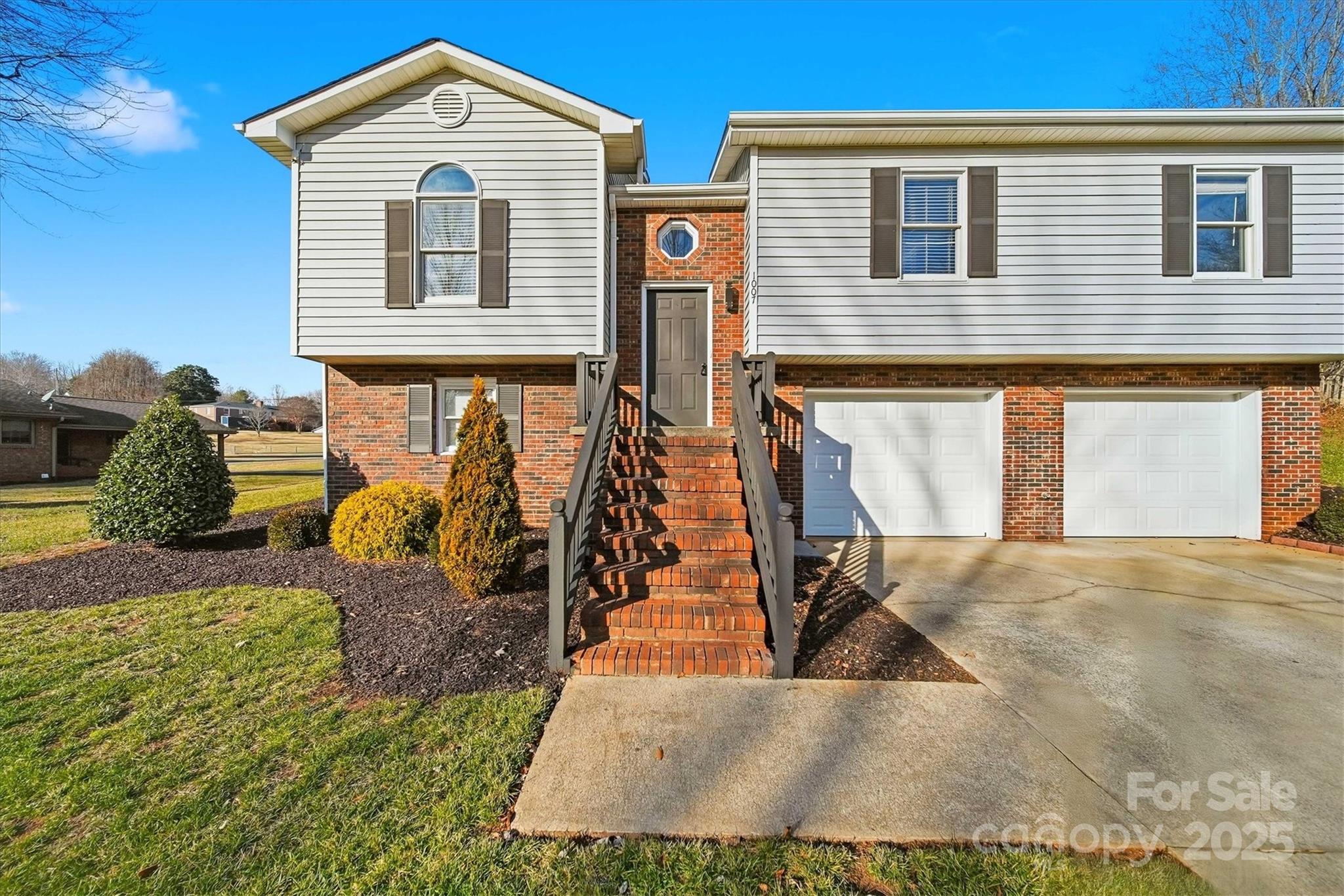 1007 Millbrook Place Southeast Lenoir, NC 28645 - Photo 3 of 46 a front view of houses with outdoor space