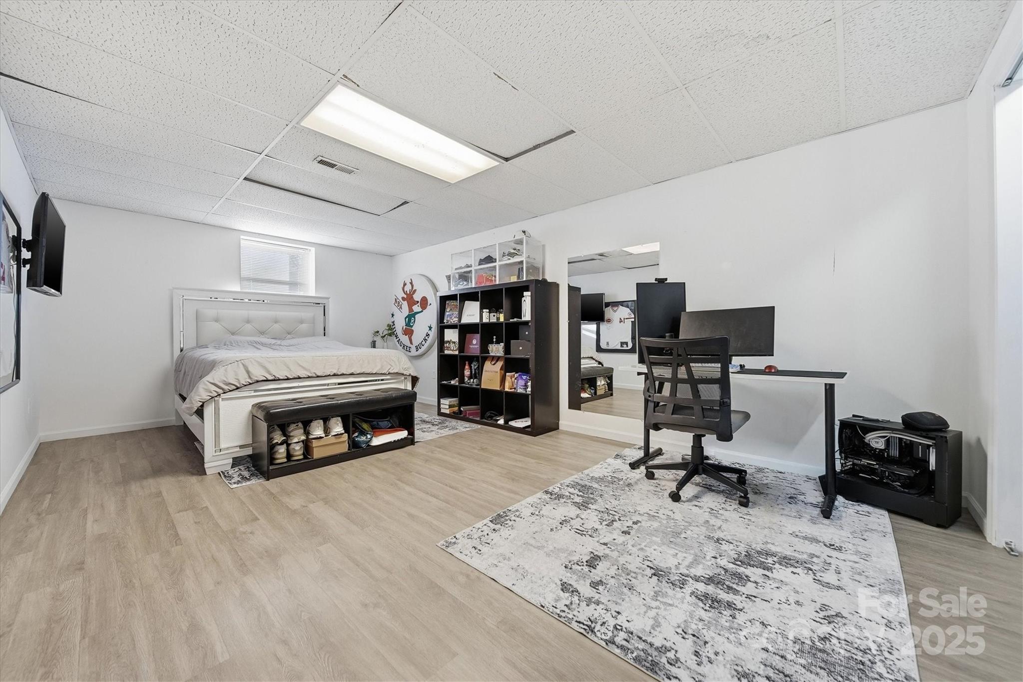 1007 Millbrook Place Southeast Lenoir, NC 28645 - Photo 31 of 46 a view of a bedroom with workspace and a window
