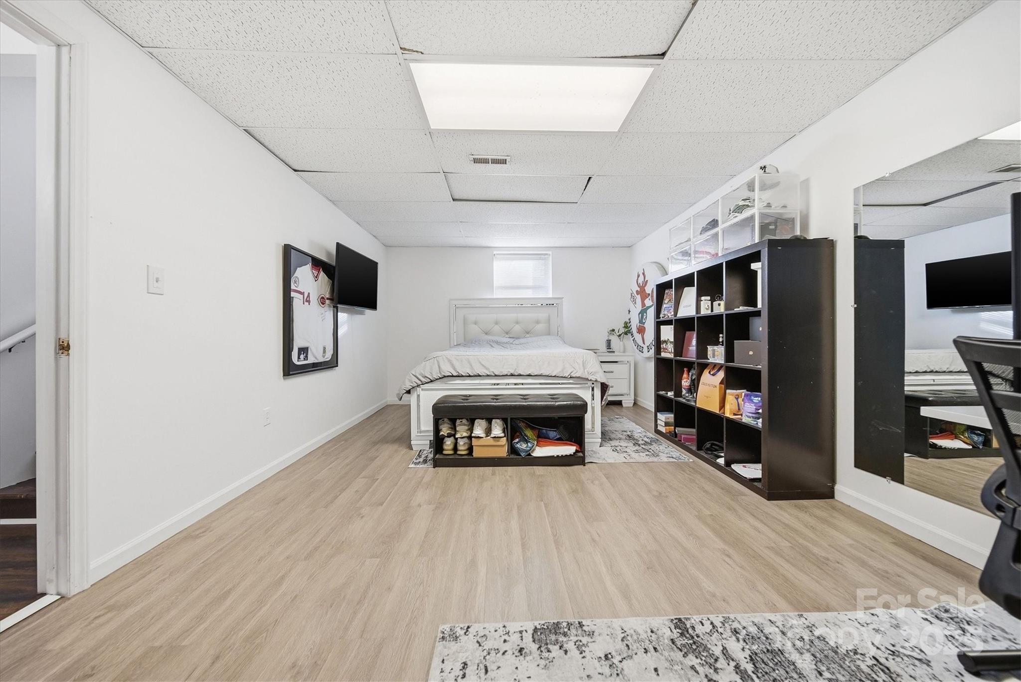 1007 Millbrook Place Southeast Lenoir, NC 28645 - Photo 32 of 46 a living room with furniture and a fireplace