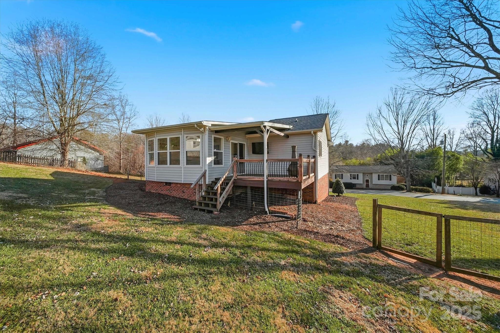 1007 Millbrook Place Southeast Lenoir, NC 28645 - Photo 39 of 46 a view of a house with a yard