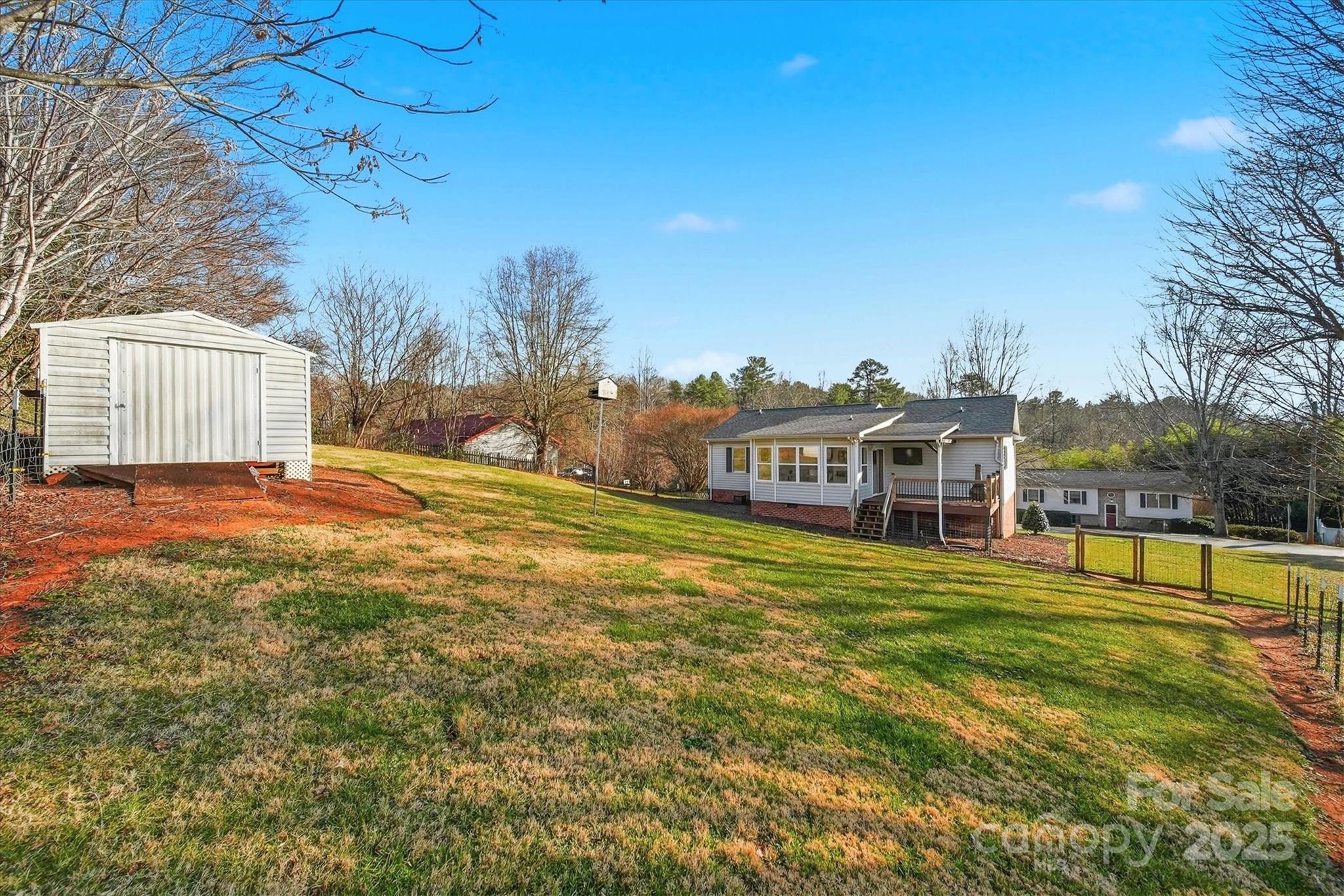 1007 Millbrook Place Southeast Lenoir, NC 28645 - Photo 40 of 46 a view of a house with a big yard