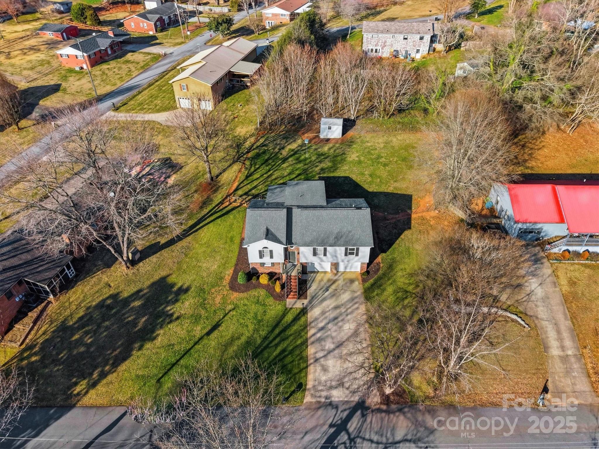 1007 Millbrook Place Southeast Lenoir, NC 28645 - Photo 45 of 46 a view of a house with a yard