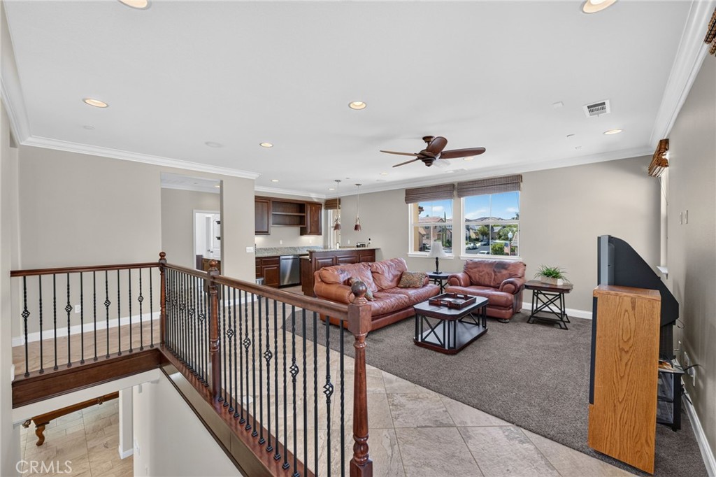 31749 Country View Road Temecula, CA 92591 - Photo 24 of 68 a living room with furniture window and a wooden floor