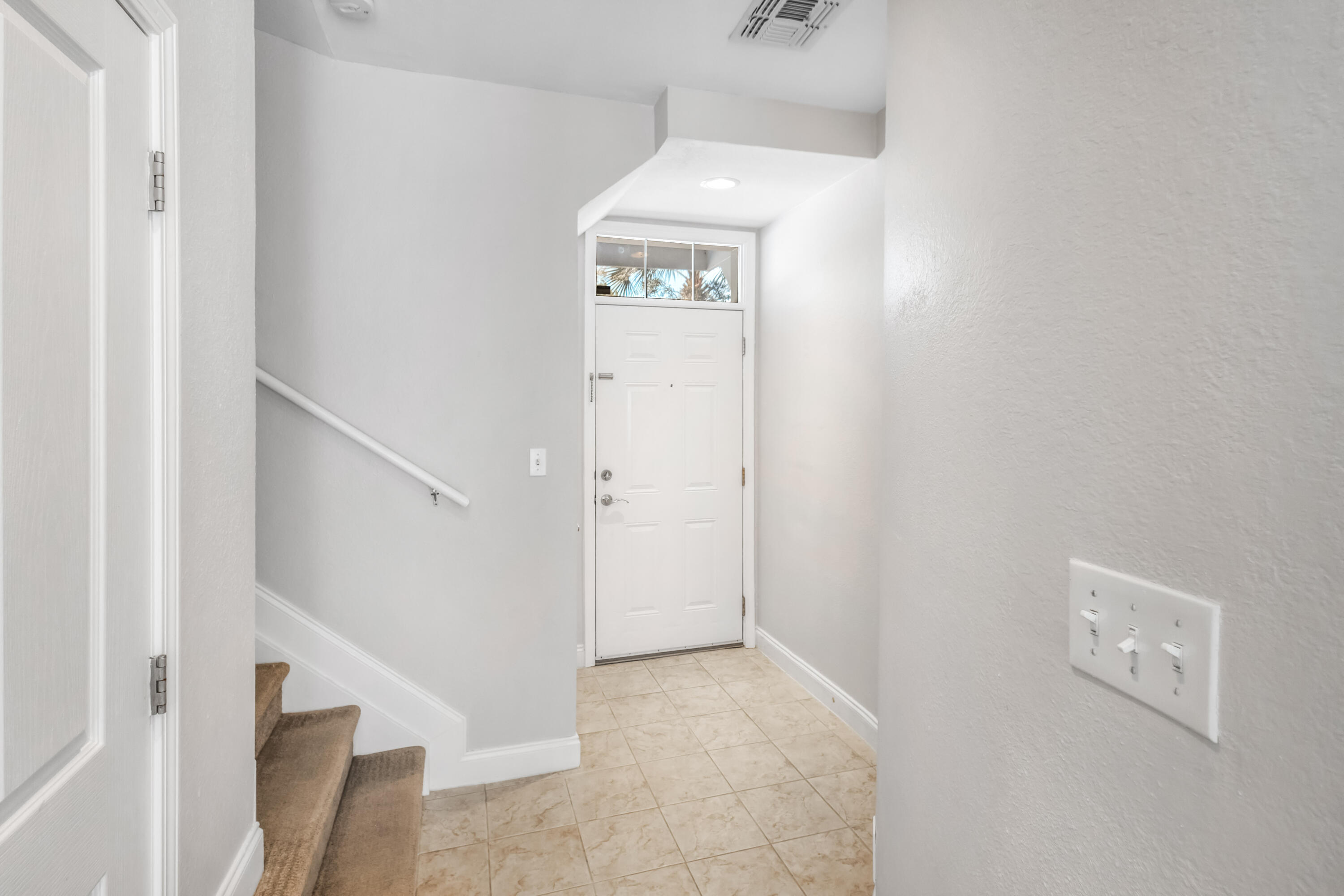 24 Talon Court, Unit 4 Santa Rosa Beach, FL 32459 - Photo 11 of 39 Foyer to 2nd level