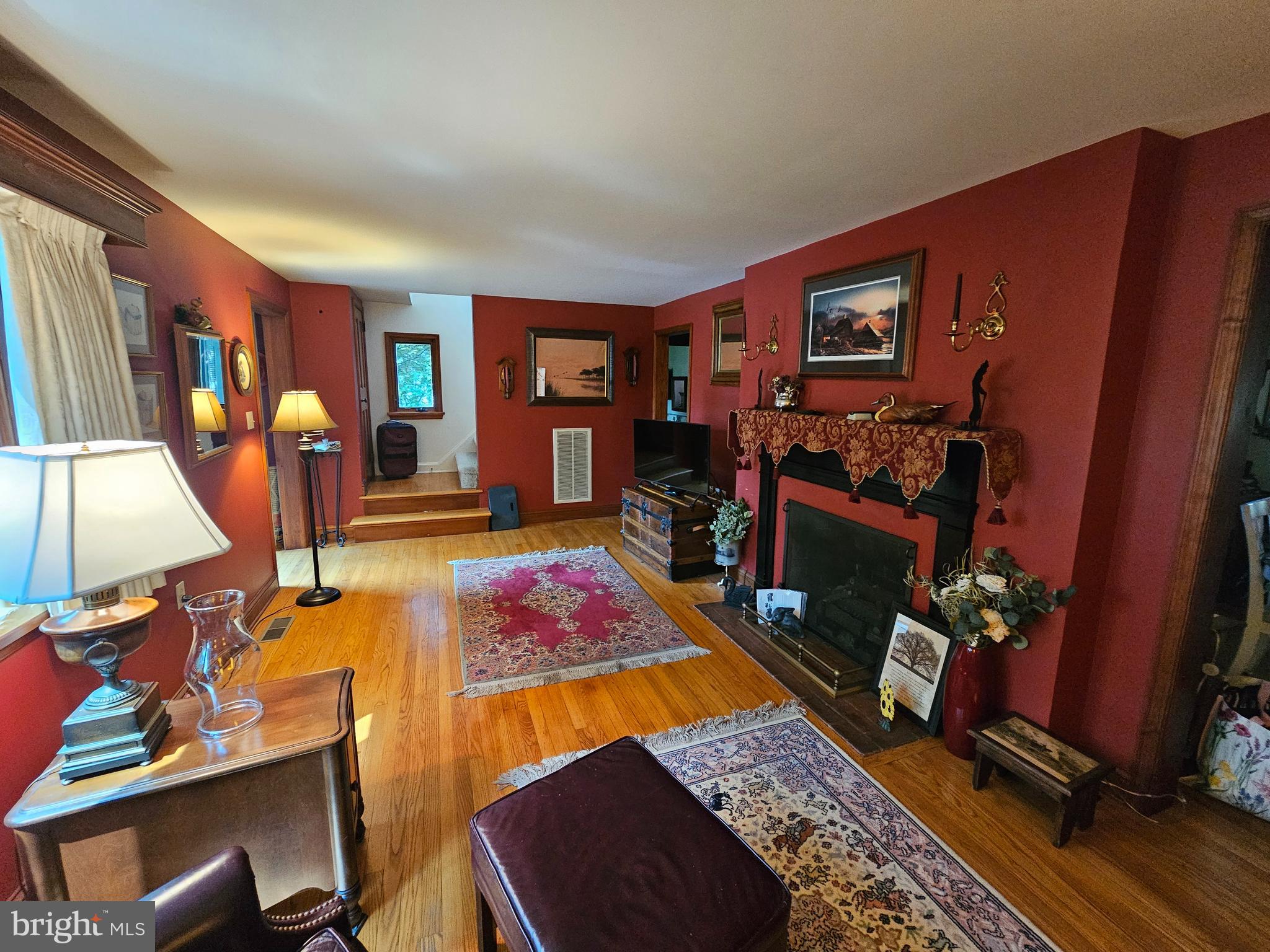 35 Read Street Seaford, DE 19973 - Photo 2 of 21 a living room with furniture a rug and a flat screen tv