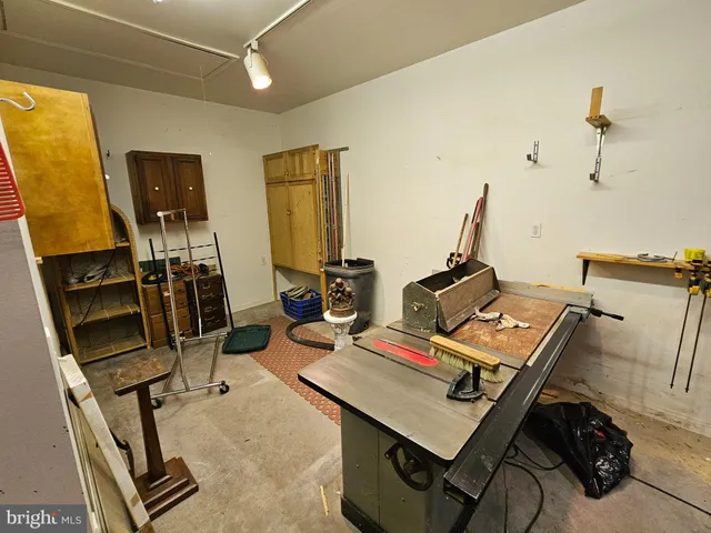 a view of a workspace with furniture