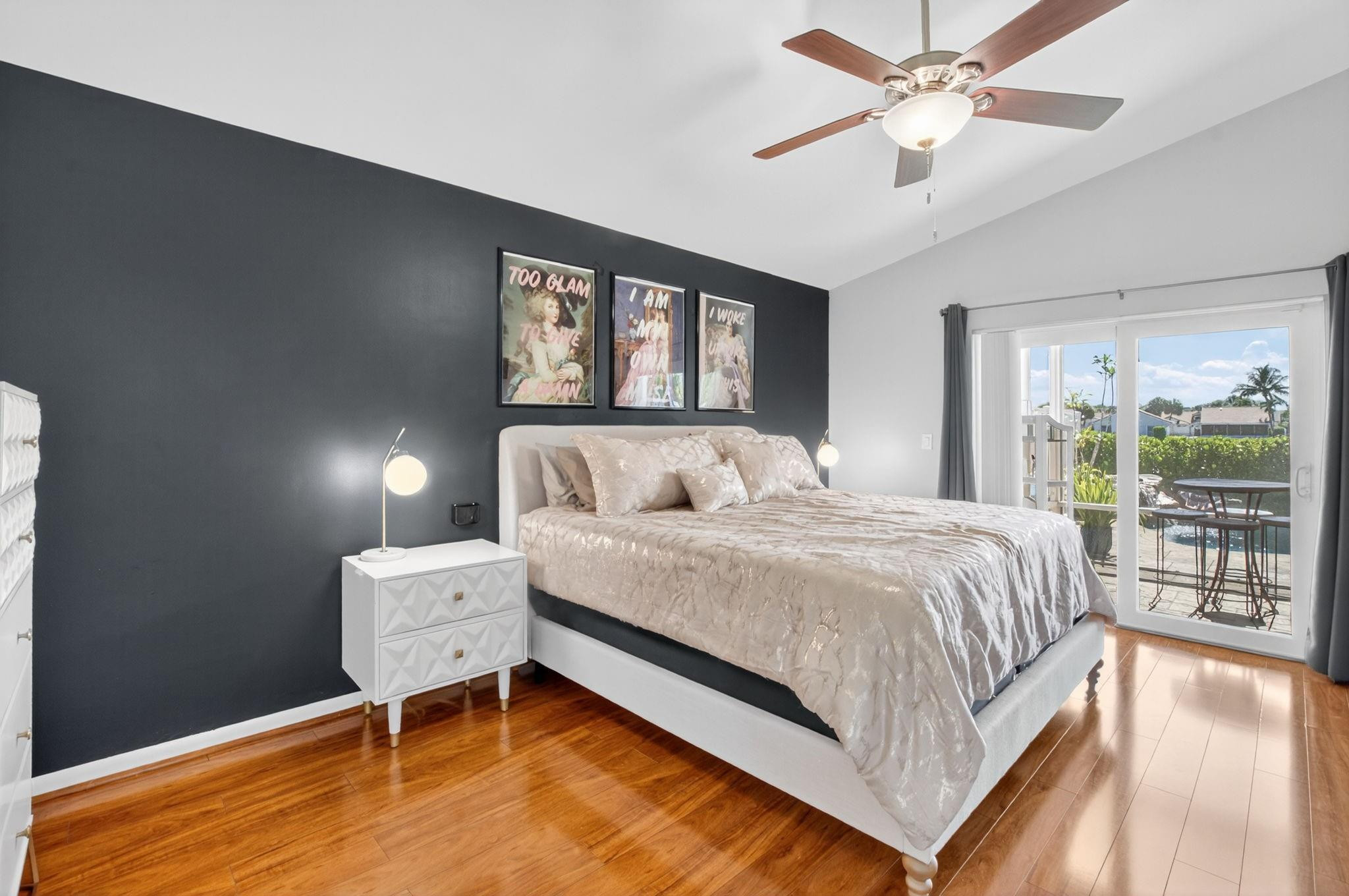 22271 Festival Way Boca Raton, FL 33428 - Photo 24 of 62 a bedroom with a bed and a large window