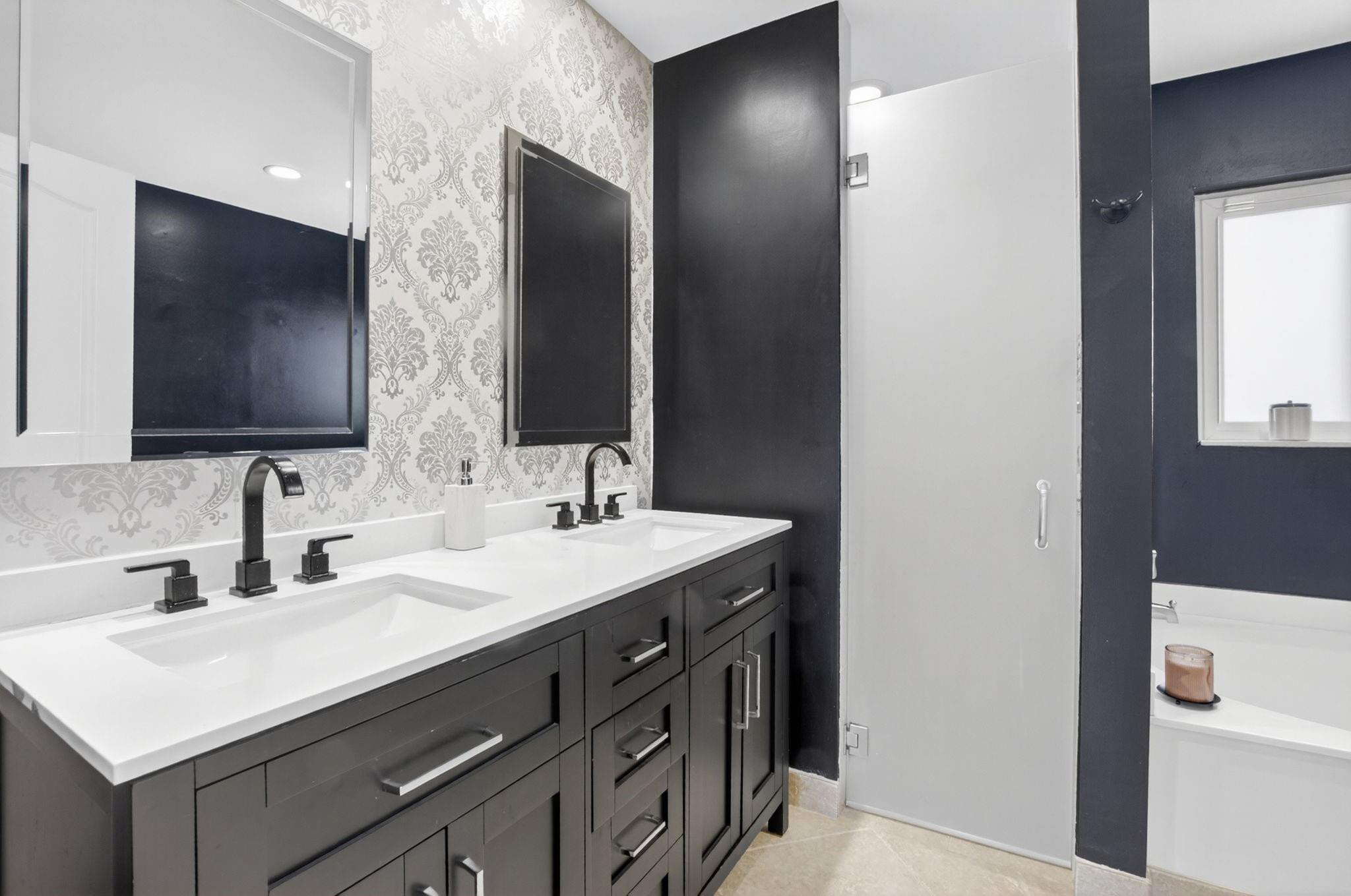 22271 Festival Way Boca Raton, FL 33428 - Photo 28 of 62 a bathroom with a double vanity sink and mirror