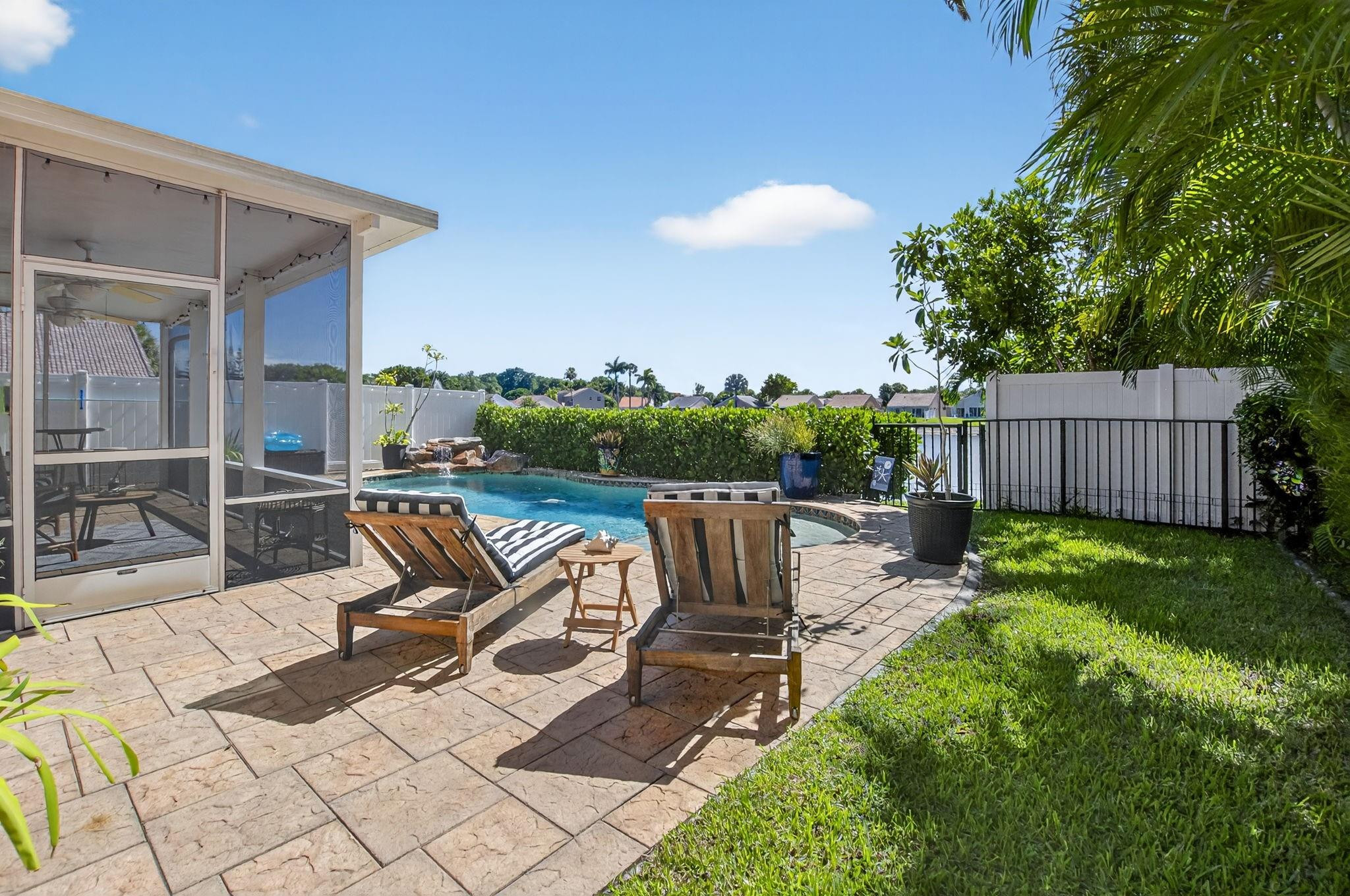22271 Festival Way Boca Raton, FL 33428 - Photo 45 of 62 a view of a backyard with sitting area