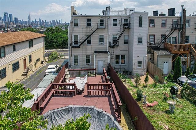302 Paterson Plank Road Jersey City, NJ 07307 - Photo 7 of 13 a view of a city with tall buildings