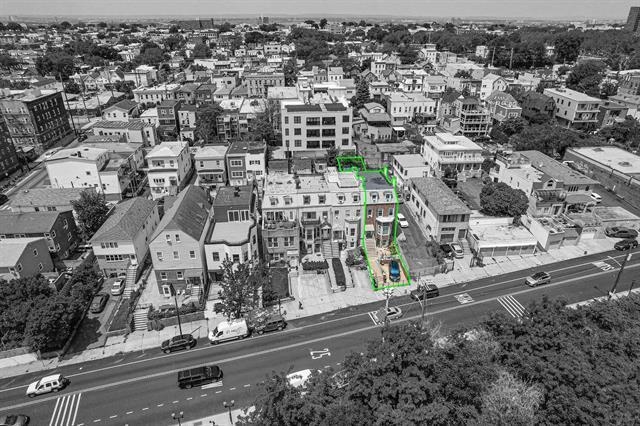 302 Paterson Plank Road Jersey City, NJ 07307 - Photo 8 of 13 an aerial view of residential house with parking space