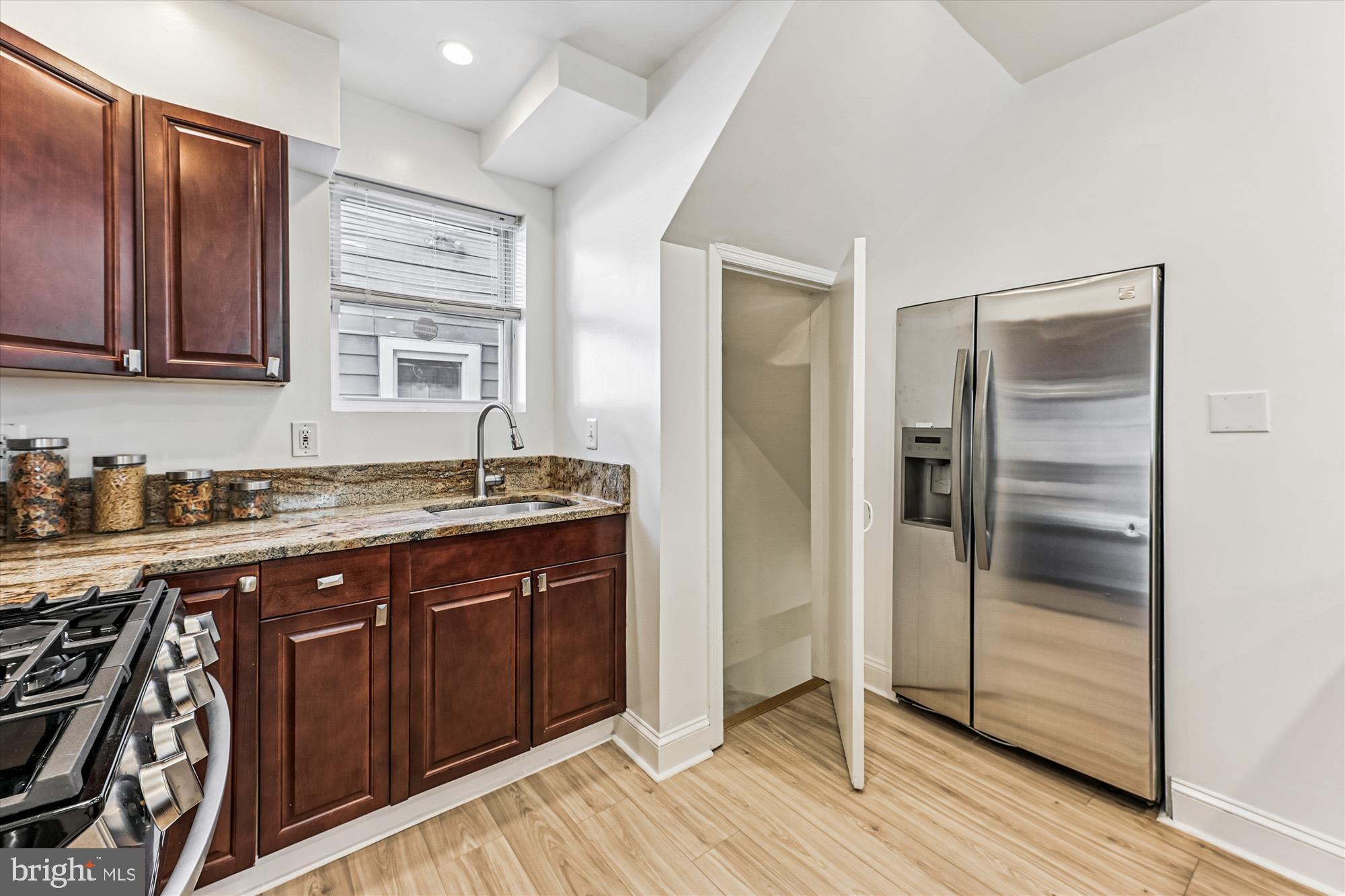 4225 Meade Street Northeast Washington, DC 20019 - Photo 9 of 46 Modern kitchen with sleek finishes.