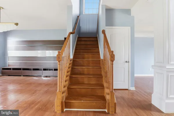 a view of entryway with wooden floor