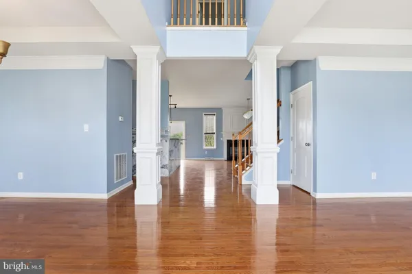 wooden floor view of an empty room and glass door
