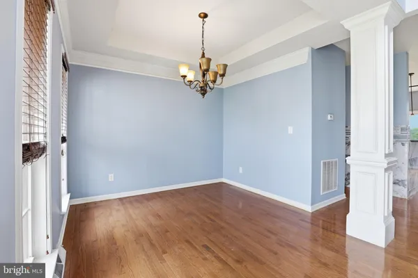 a view of a chandelier in a room