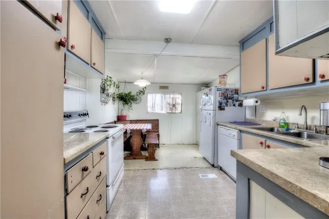 a bedroom with a bed and a mirror